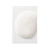 A white oval shaped object on top of a table.